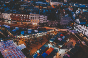 An aerial view of the twinkling festive chalets at the Exeter Cathedral Christmas Market. 